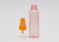 Les bouteilles en plastique rechargeables mates du jet 60ml du rose 18mm avec la brume fine orange pompent