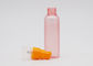 Les bouteilles en plastique rechargeables mates du jet 60ml du rose 18mm avec la brume fine orange pompent