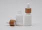 L'Aromatherapy en verre blanc de porcelaine met 30ml en bouteille avec le compte-gouttes blanc en bambou