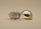 Les conteneurs crèmes cosmétiques de forme de boule, maquillage vide de cercle d'or cogne