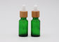 Bouteilles en verre cosmétiques vertes de compte-gouttes de l'huile 18mm avec la pipette en bambou d'impression de compte-gouttes