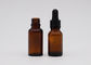 Utilisation matérielle en verre ambre de bouteilles de compte-gouttes d'huile essentielle pour l'huile de soins de la peau
