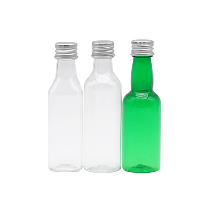 Bouteille cosmétique de jet de long cou en plastique vert transparent avec les couvercles à visser 100ml