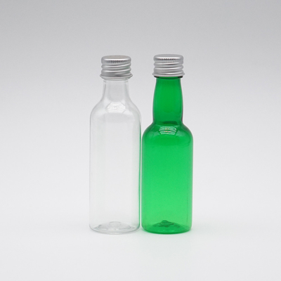 Bouteille cosmétique de jet de long cou en plastique vert transparent avec les couvercles à visser 100ml
