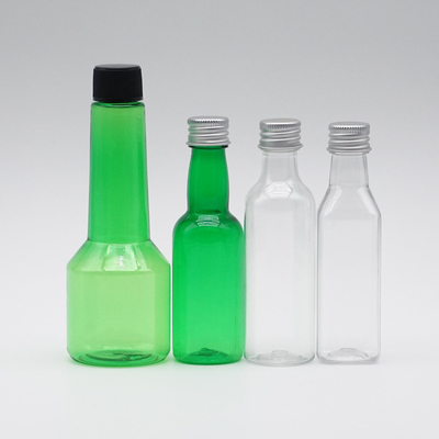Bouteille cosmétique de jet de long cou en plastique vert transparent avec les couvercles à visser 100ml